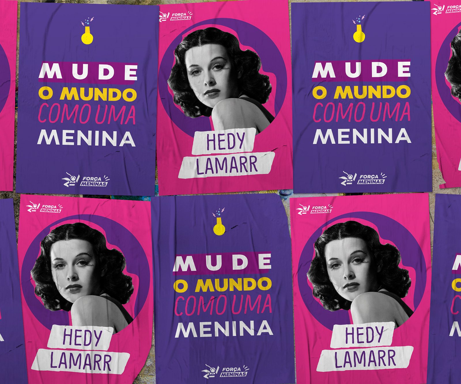 Força Meninas posters in purple and pink pasted on a wall